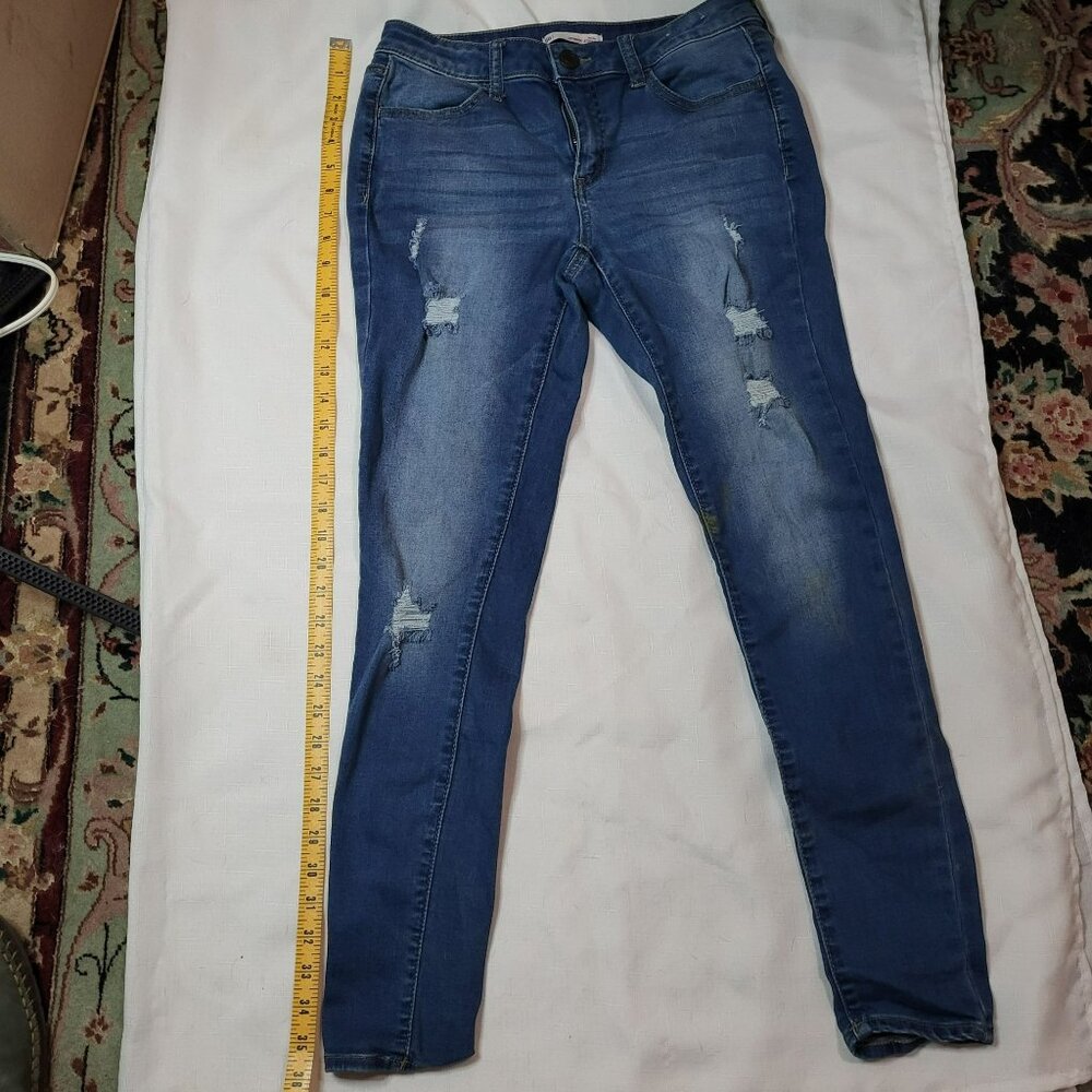 Ultimate Jegging Low Rise Distressed Denim Jeans